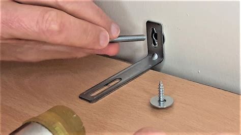 using metal l brackets to attach bookcase to walls|bookcase anchor brackets.